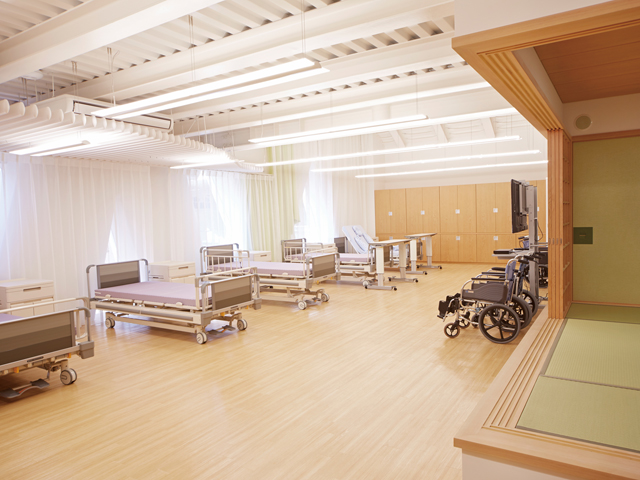 介護実習室。広々とした空間で移動介助を学びます